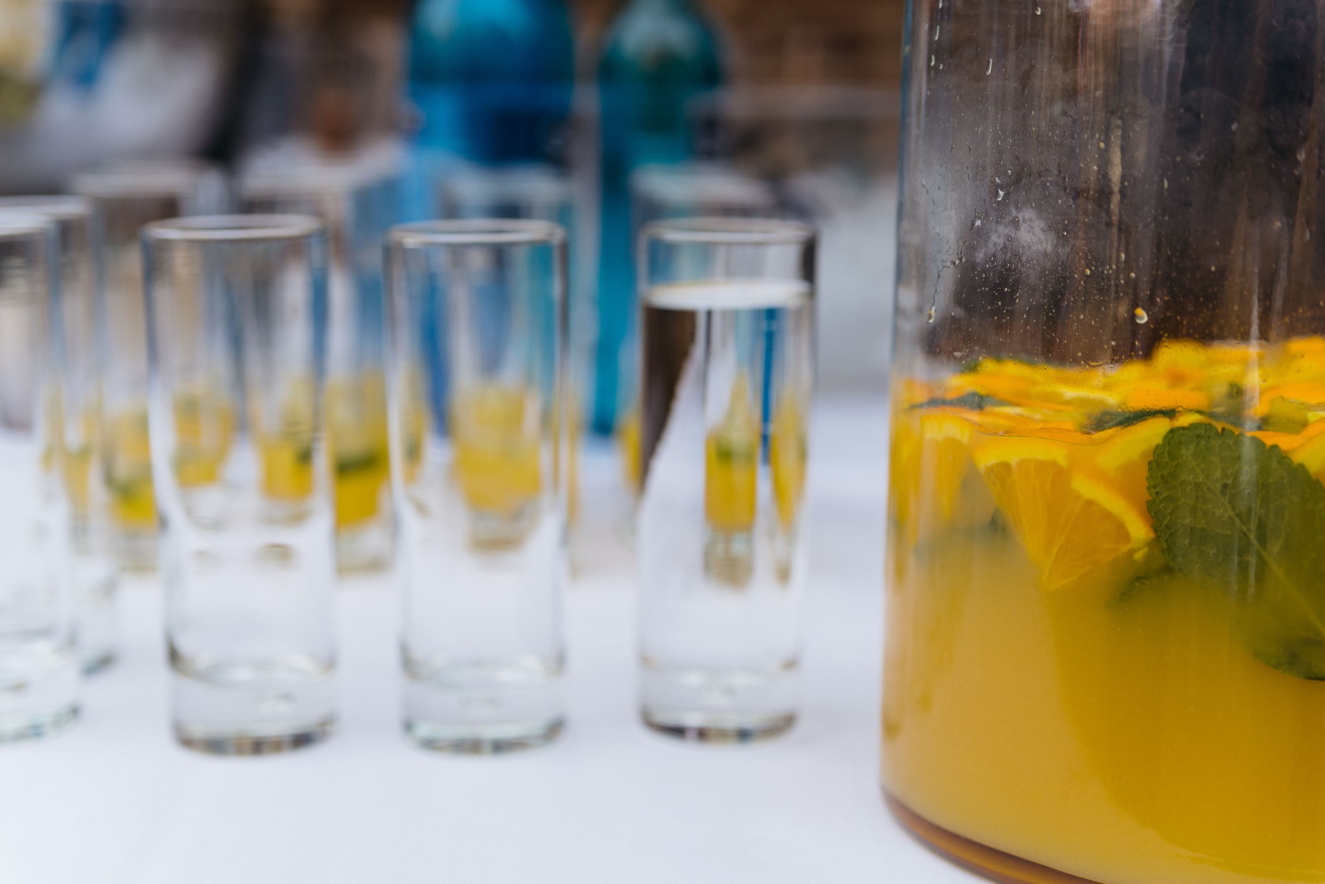 Homemade Orange Lemonade with Fresh Mint Served in Tall Glasses